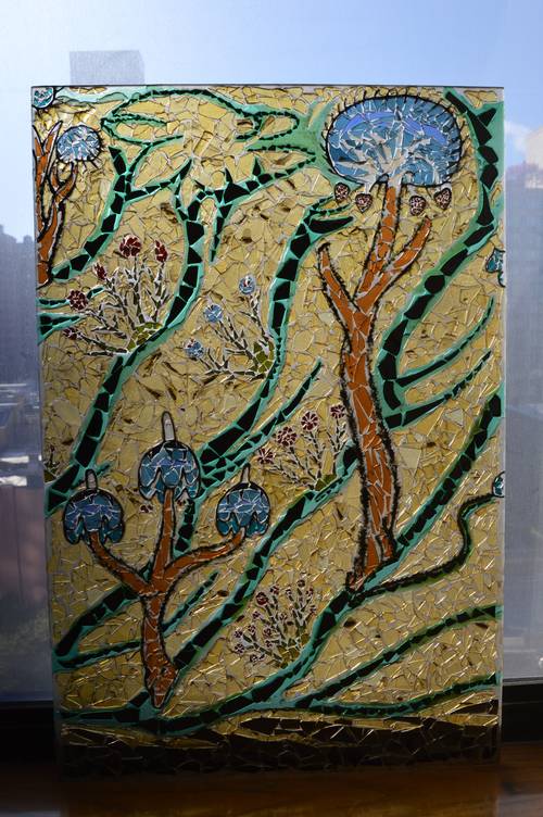 		                                		                                <span class="slider_title">
		                                    Trees and Flowers		                                </span>
		                                		                                
		                                		                            	                            	
		                            <span class="slider_description">Example of Juliene Berk's early stained glass. Image courtesy of artist.</span>
		                            		                            		                            